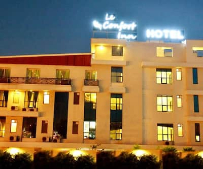 https://imgcld.yatra.com/ytimages/image/upload/t_hotel_yatra_city_desktop/v1479727233/Domestic Hotels/Hotels_Jaipur/Le Confort Inn/Overview.jpg